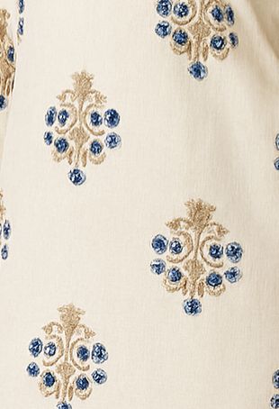 Graceful Cream Kurti with Dori Neck Design