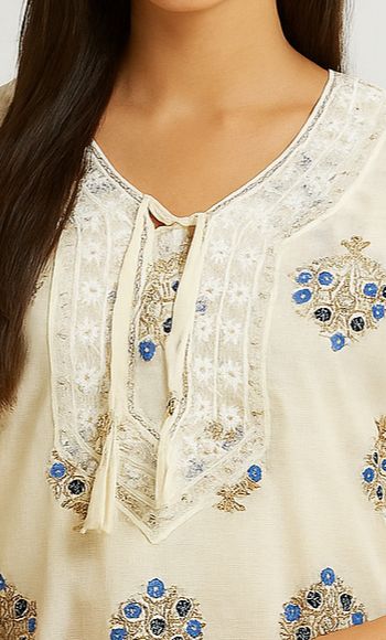 Graceful Cream Kurti with Dori Neck Design